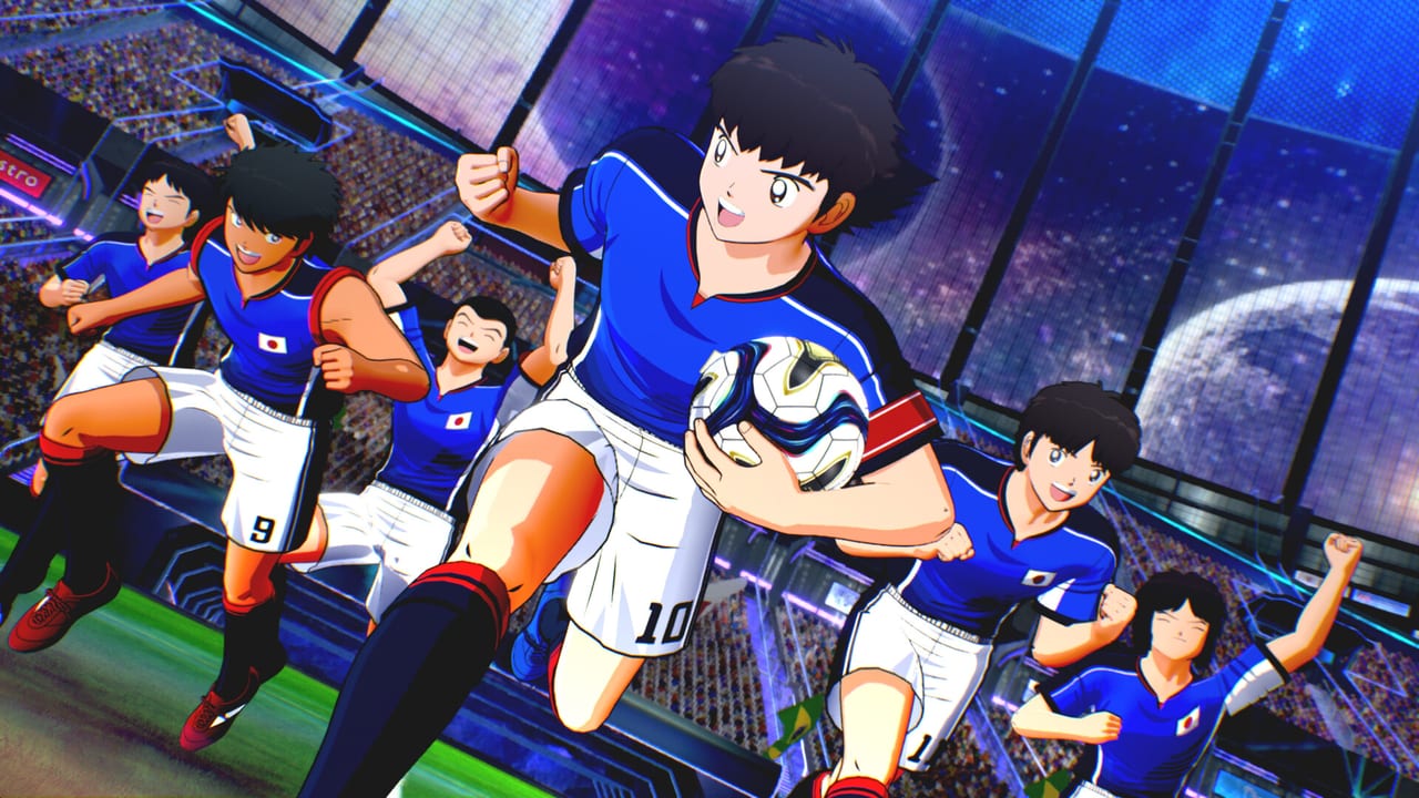 Captain Tsubasa 2: World Fighters screenshot of Tsubasa Ozora and Japan Youth charging forward in a packed stadium